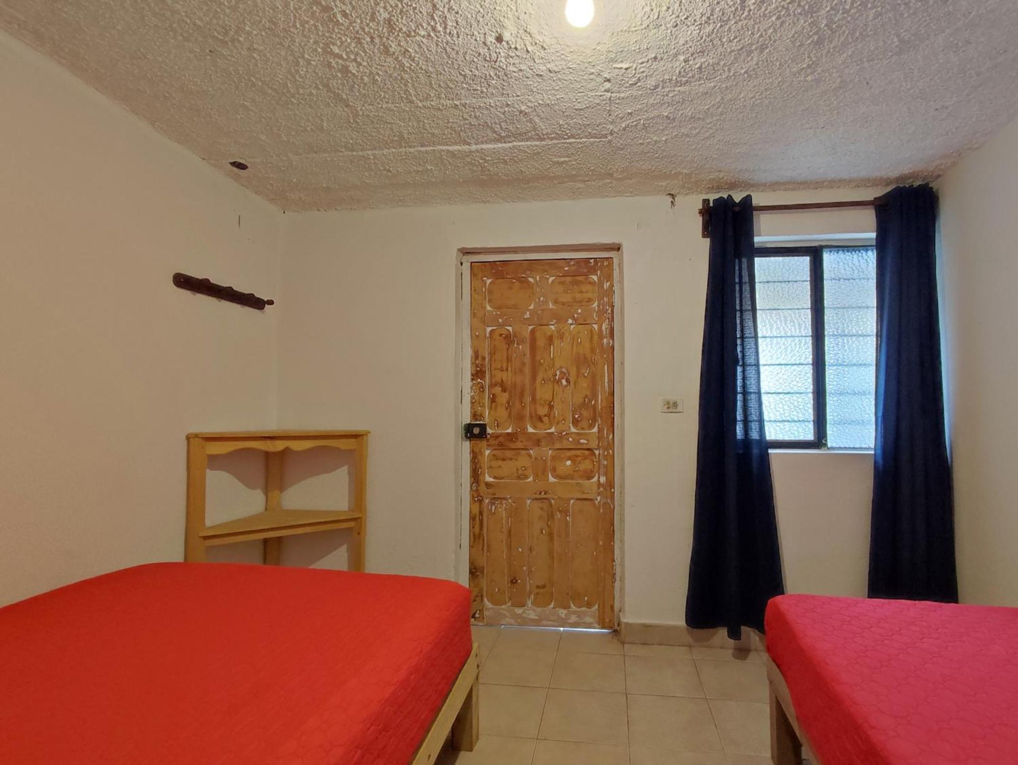 Hostal Ikal Сан-Крістобаль-де-лас-Касас Номер фото